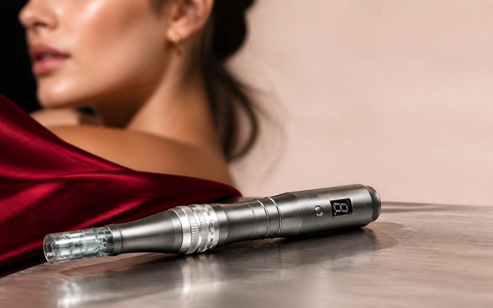 DrPenX microneedling pen in a warm editorial skincare setting